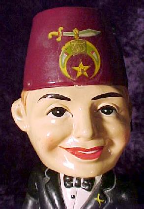 Bobble-headed shriner not present at parade.